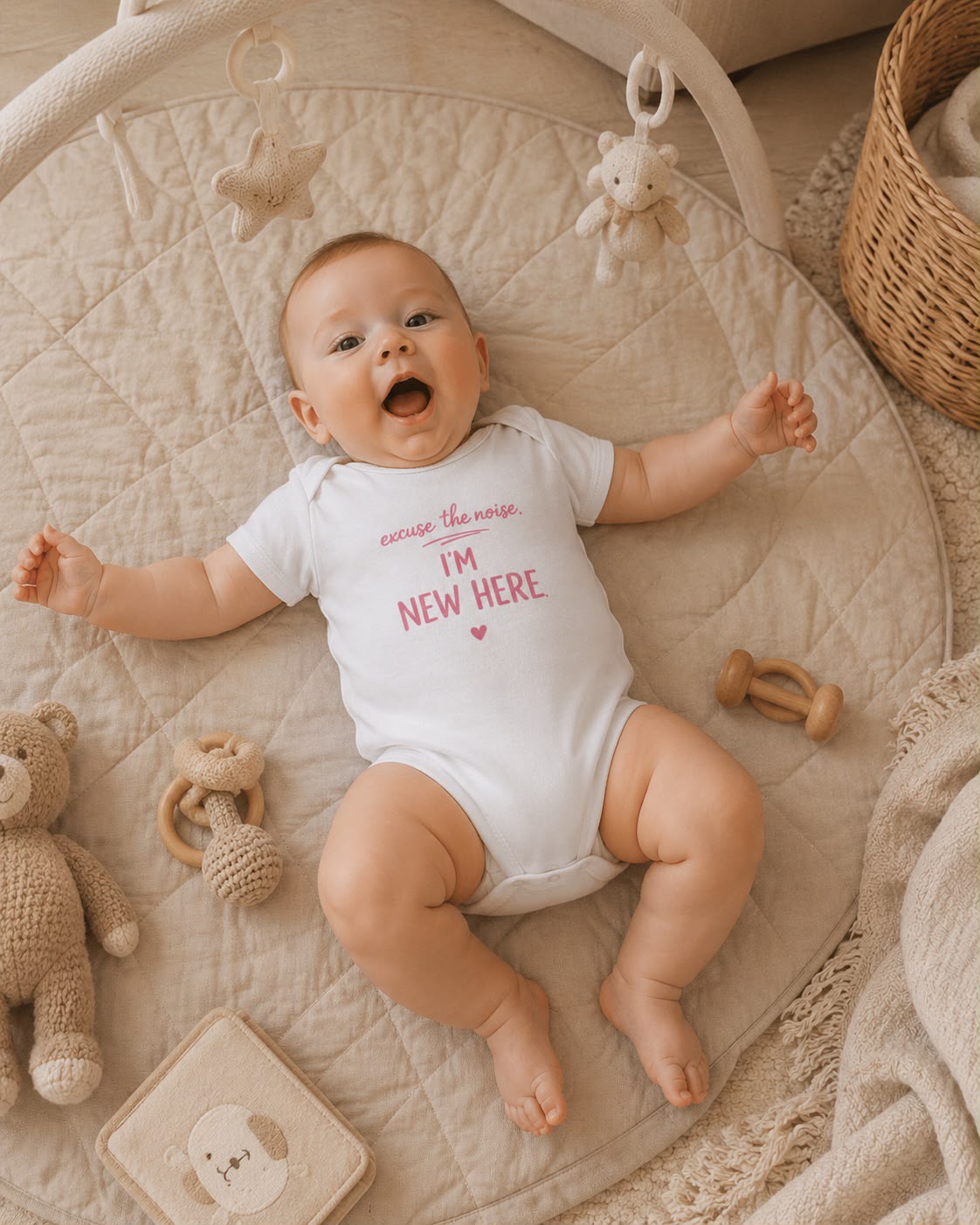 Excuse The Noise Im New Here baby bodysuit lifestyle photo, white, playmat scene