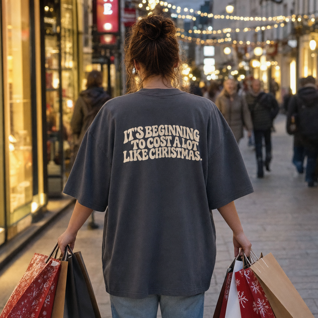 It's Beginning to Cost a Lot Like Christmas oversized tee, back print, worn Christmas shopping